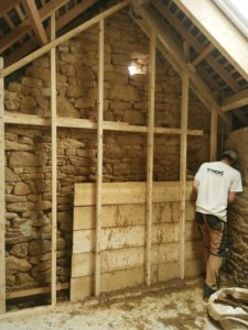 Coffrage bois enduit terre paille